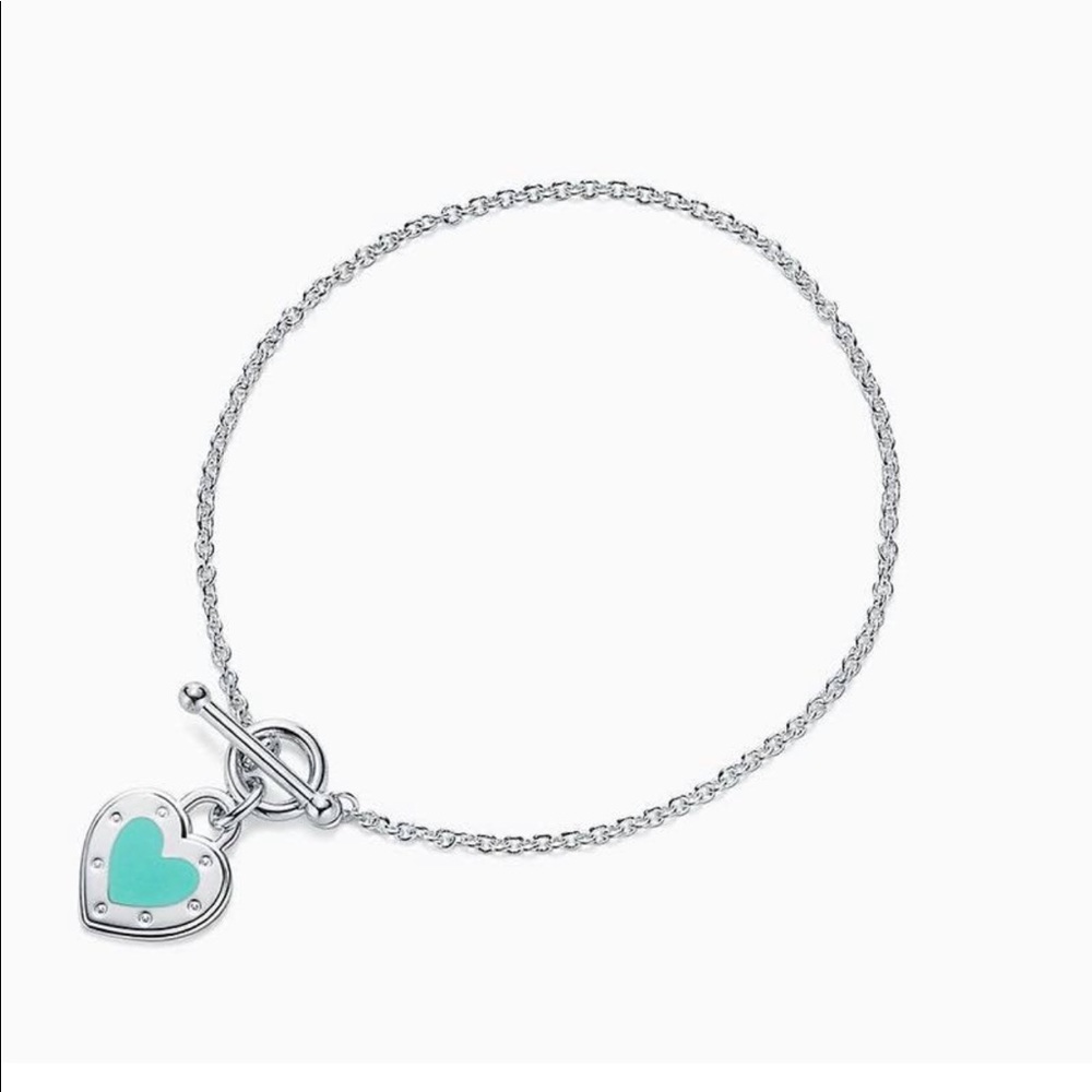 - Tiffany silver bracelet with blue emerald hear